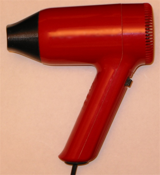 A handheld hair dryer.